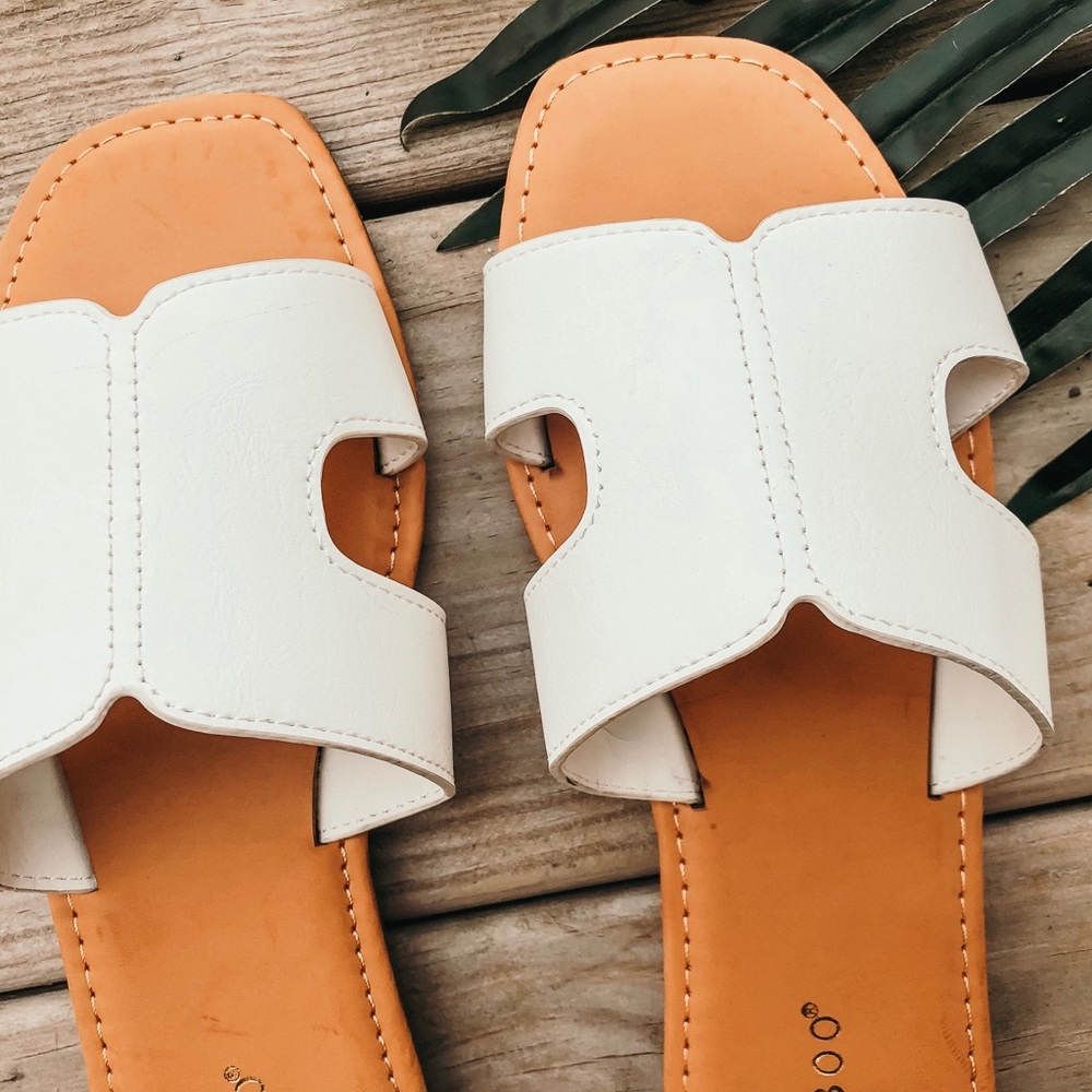 White flat sandals
